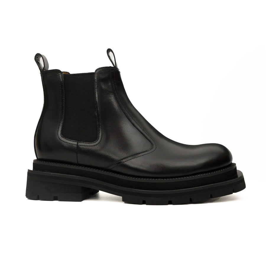Bottines Chelsea noires à brogues avec semelle à crampons