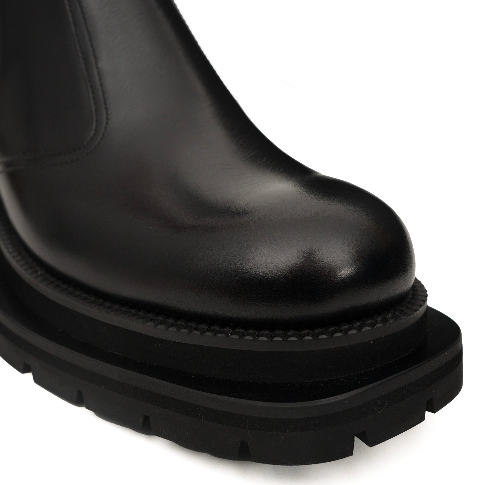 Bottines Chelsea noires à brogues avec semelle à crampons