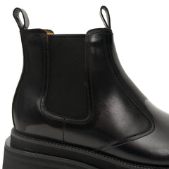 Bottines Chelsea noires à brogues avec semelle à crampons