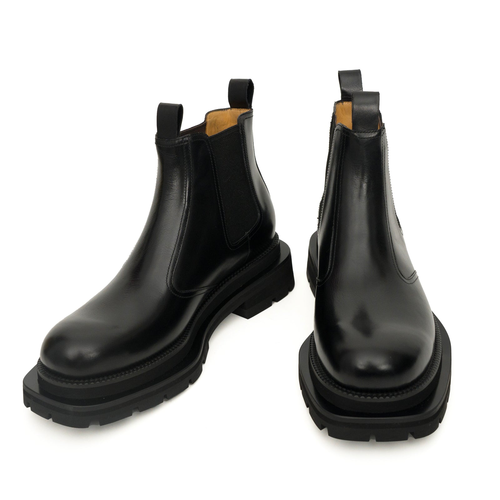 Bottines Chelsea noires à brogues avec semelle à crampons