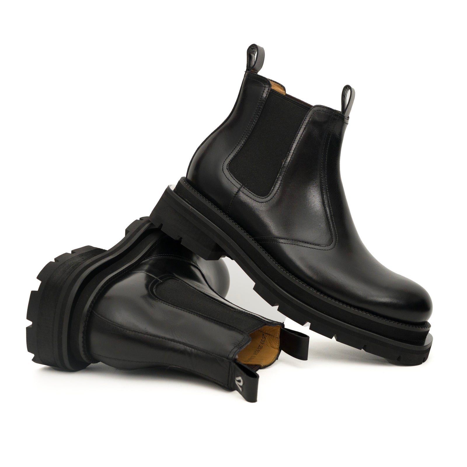 Bottines Chelsea noires à brogues avec semelle à crampons