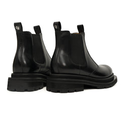 Bottines Chelsea noires à brogues avec semelle à crampons