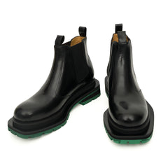 Bottines Chelsea noires à brogues avec semelle à crampons