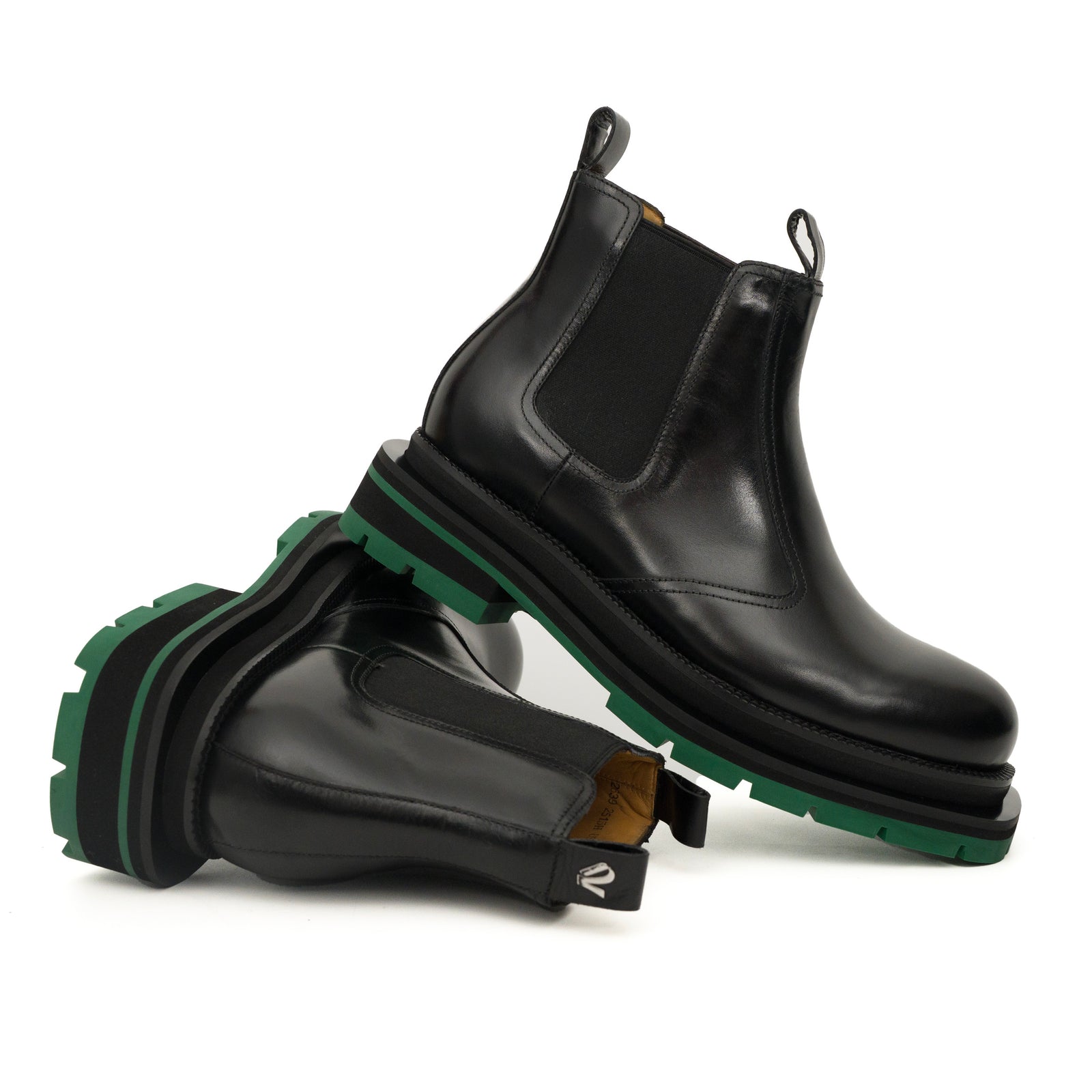 Bottines Chelsea noires à brogues avec semelle à crampons