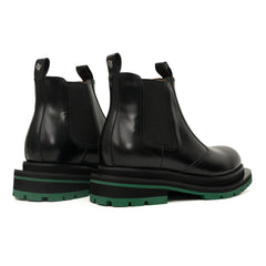 Bottines Chelsea noires à brogues avec semelle à crampons