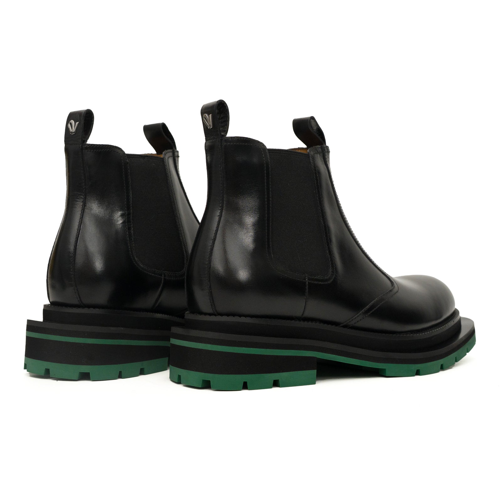 Bottines Chelsea noires à brogues avec semelle à crampons