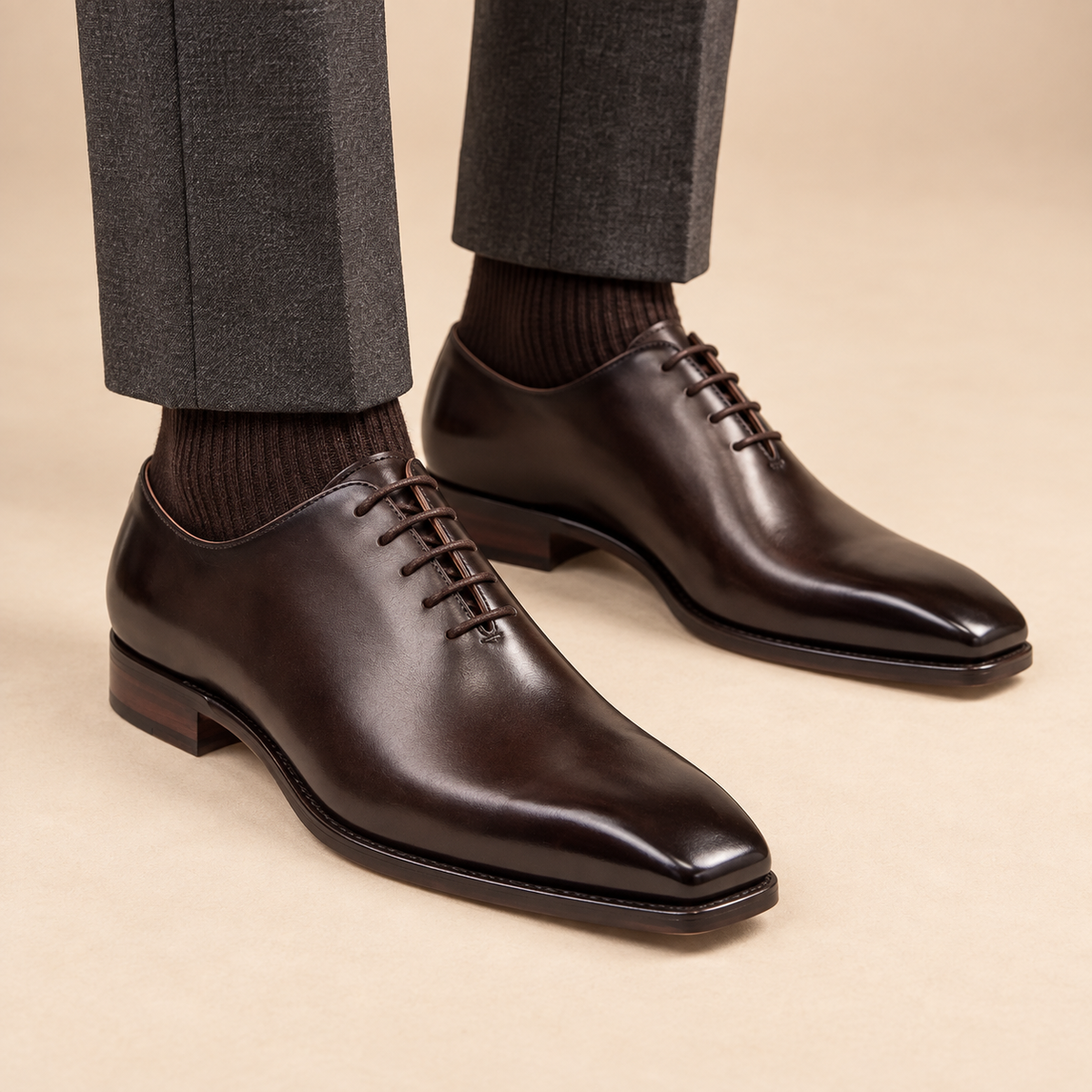 Dark brown square-toe Oxford shoes with polished finish on model lower legs, DIVINCH D841