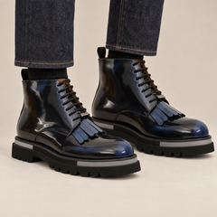 DIVINCH blue-shaded glossy plain-toe fringe ankle boots worn with raw indigo denim