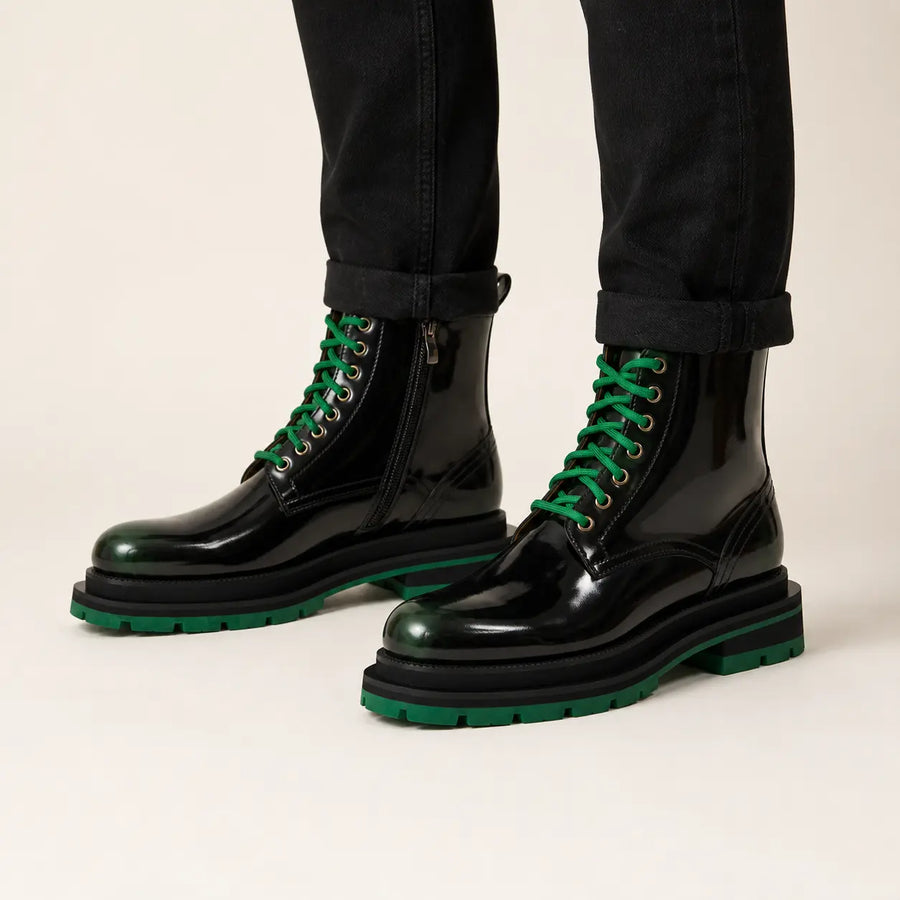 Green-black high gloss lace-up boots on-foot studio photo