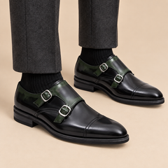 Dark green cap-toe double monk strap shoes with glossy finish on model