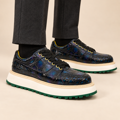 Iridescent blue-black textured platform apron-toe sneaker on foot