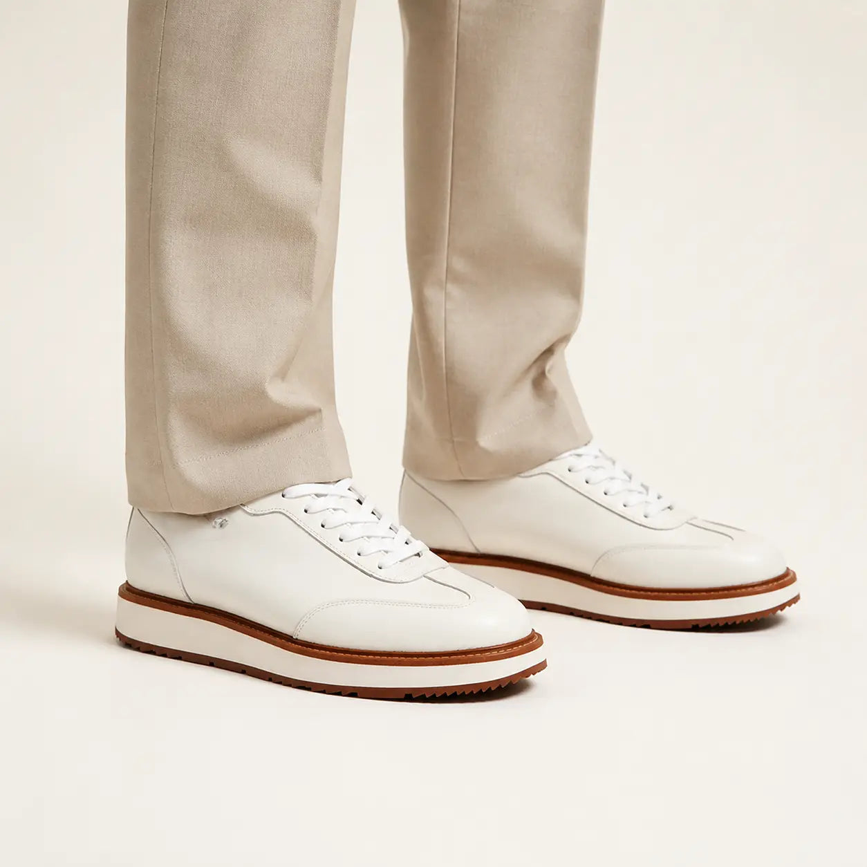 DIVINCH ivory platform derby sneaker on foot in warm studio