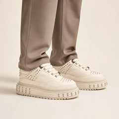 Ivory Studded Platform Sneaker — on-foot studio view