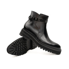 Botines Chelsea de cuero negro con hebilla
