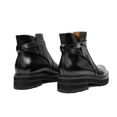 Botines Chelsea de cuero negro con hebilla