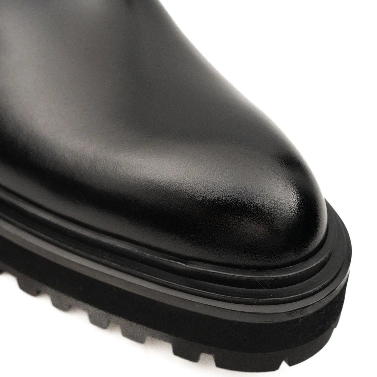 Botines Chelsea de cuero negro con hebilla