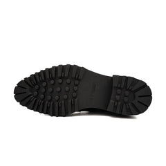 Botines Chelsea de cuero negro con hebilla