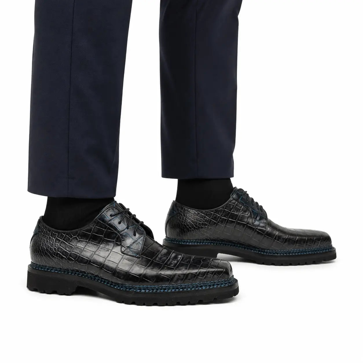 Midnight crocodile Derby shoes on foot