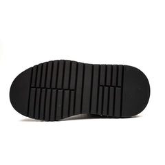 Sneaker con plateau e borchie effetto coccodrillo