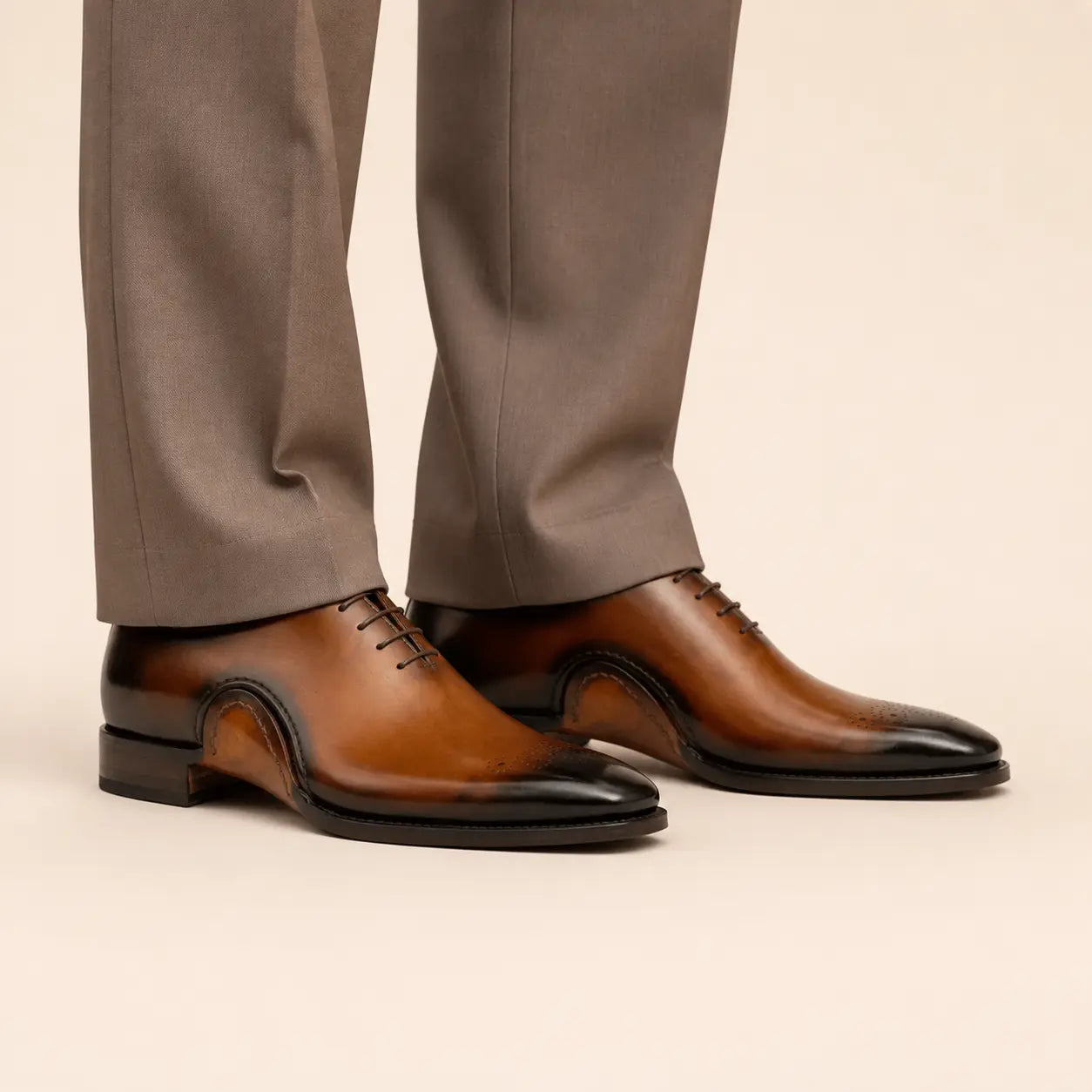 DIVINCH patina medallion Oxford shoes — on-foot studio view
