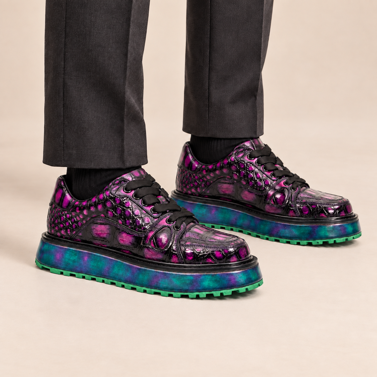 Purple and black textured platform apron-toe sneaker on foot