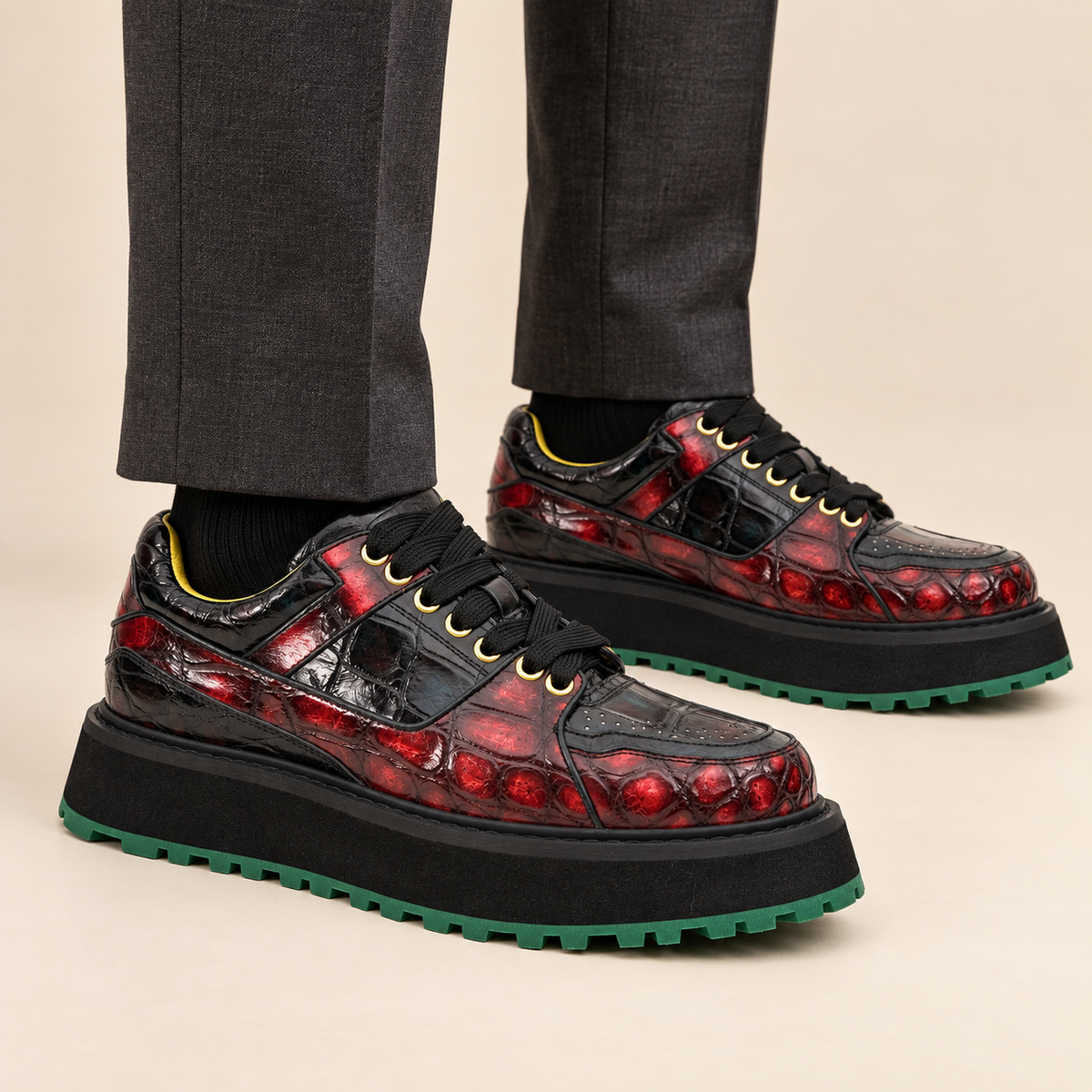 Red and black textured platform apron-toe sneaker on foot