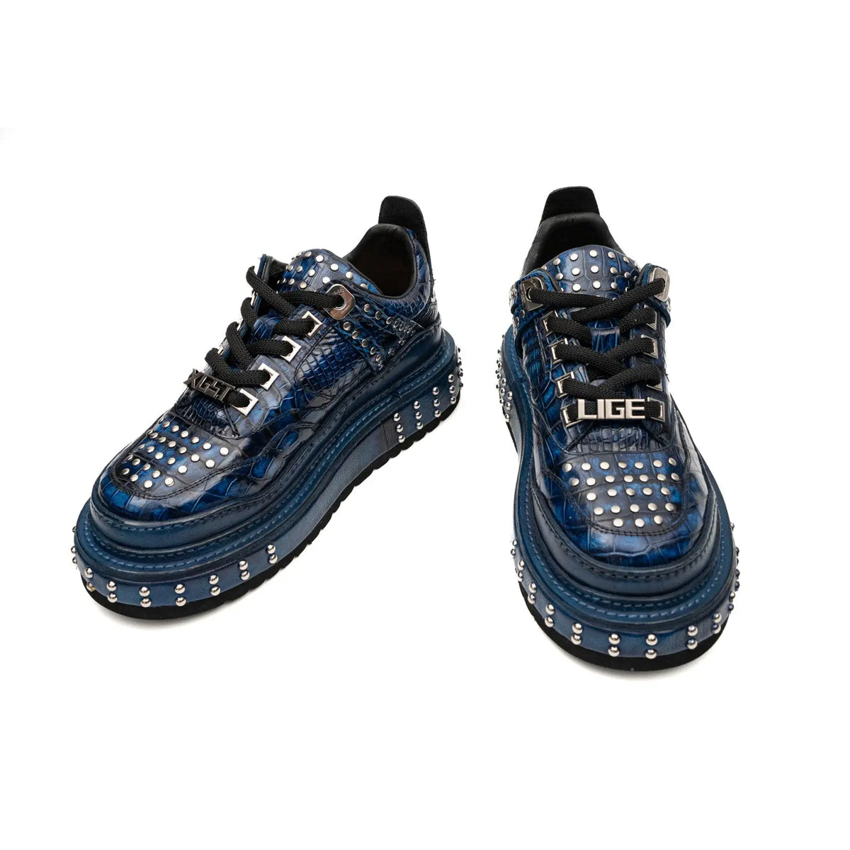Zapatillas deportivas de plataforma con tachuelas de cocodrilo color medianoche