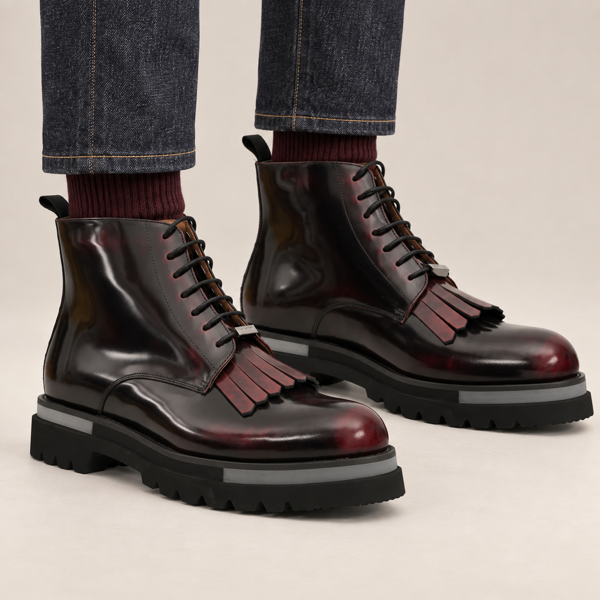 DIVINCH shaded dark burgundy plain-toe fringe ankle boots worn with raw indigo denim