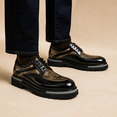 DIVINCH antique bronze and black moc-toe lug Derby shoes worn on foot