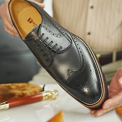 Brogue Derby con suola a carrarmato nera